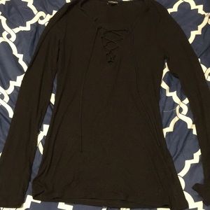 Long sleeve black shirt that laces up the front